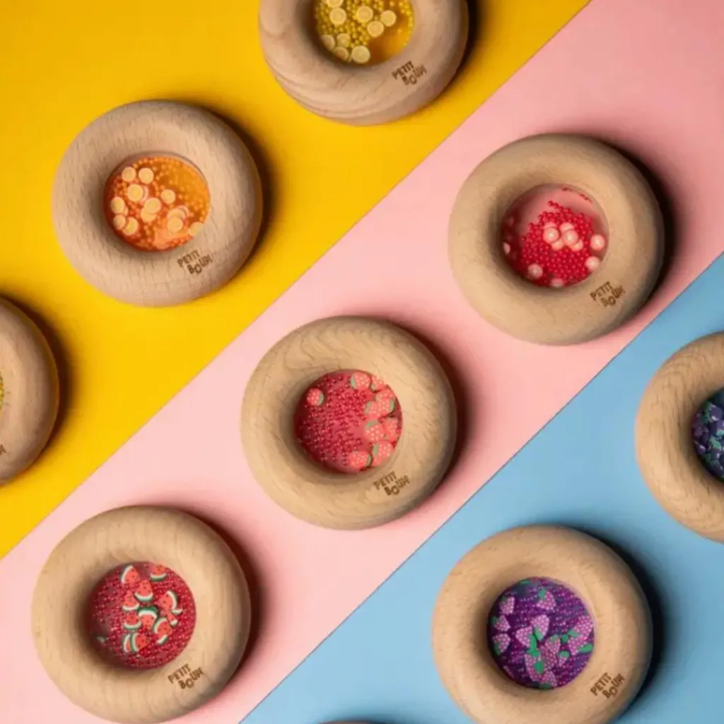 Hochet sensoriel Sensory Donut oranges Bouteille Sensorielle